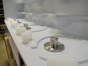 Single-use mixing cabinet close up featuring top-mounted magnetic mixer drives