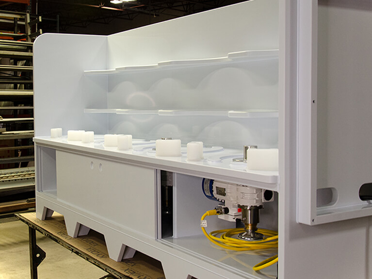 Custom fabricated magnetic drive mixing cabinet showing a magnetic drive under the cabinet